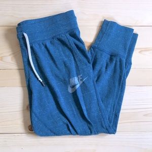 cropped blue nike joggers